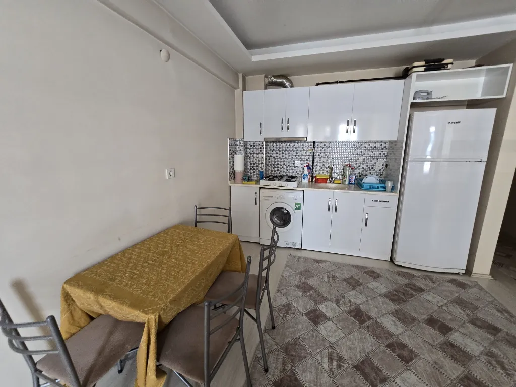 BULUNUR EMLAKTAN ORTA MAHALLEDE EŞYALI KİRALIK 2+1 ARA KAT DAİRE